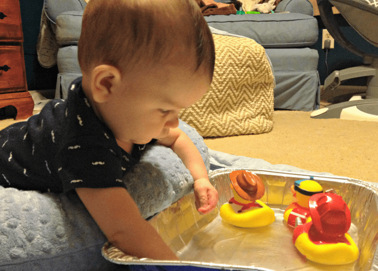 The best nursing pillow! This thing is perfect for mom's maternity pillow in pregnancy, for a super comfortable breastfeeding pillow, AND for baby's tummy time pillow. It's even better than the Boppy pillow...